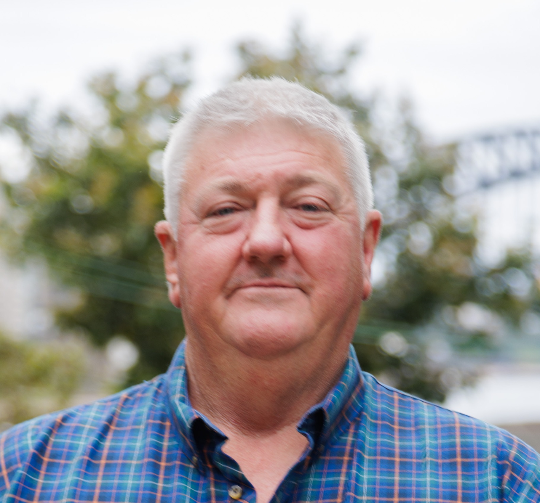 Headshot of Mark Elgar — Director